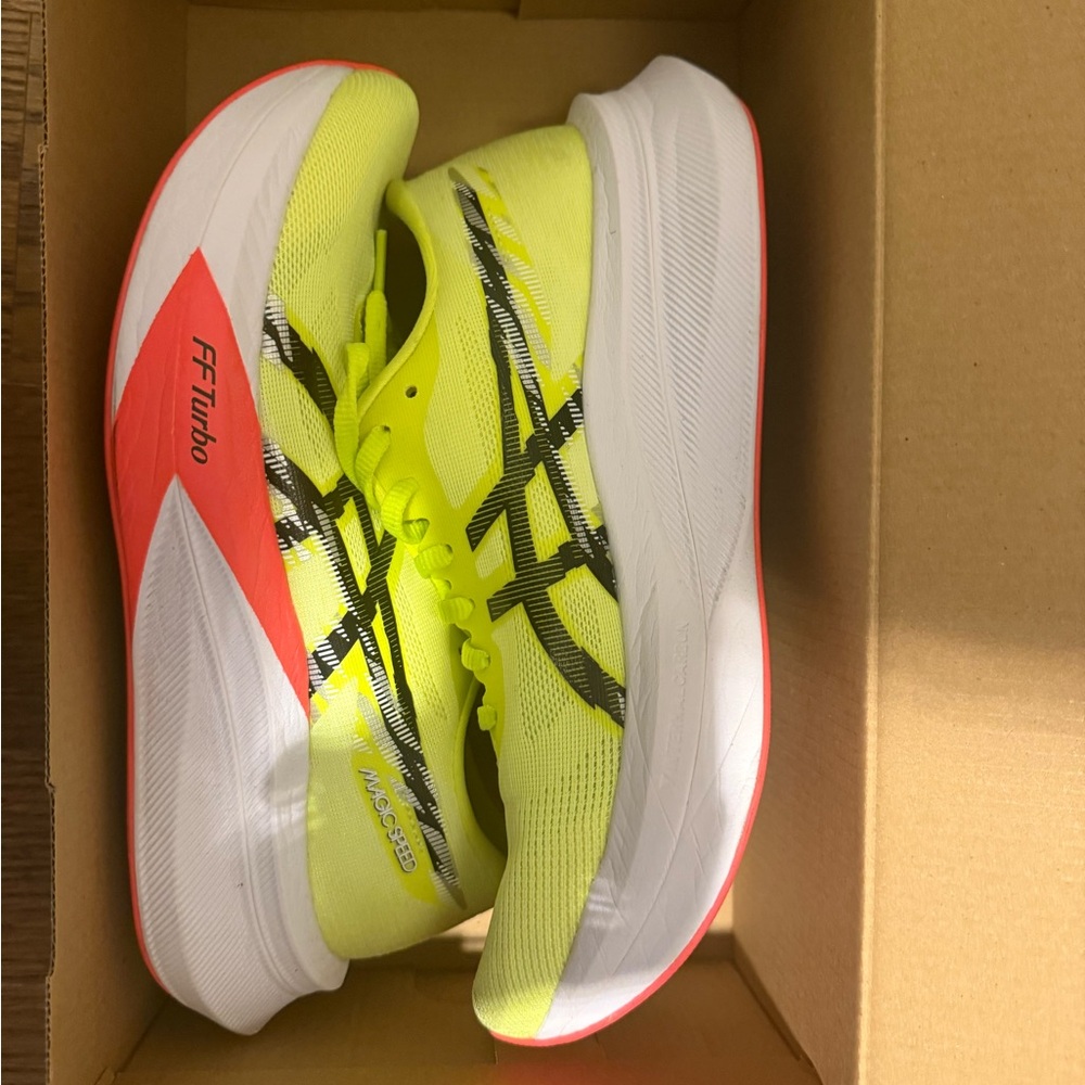 Gently worn Asics Magic Speed 4 size 9